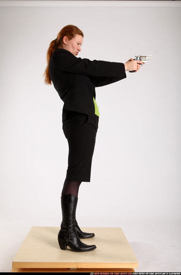 Woman Adult Average White Fighting with gun Standing poses Business