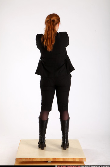 Woman Adult Average White Fighting with gun Standing poses Business