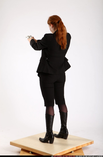 Woman Adult Average White Fighting with gun Standing poses Business