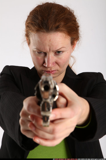 Woman Adult Average White Fighting with gun Standing poses Business