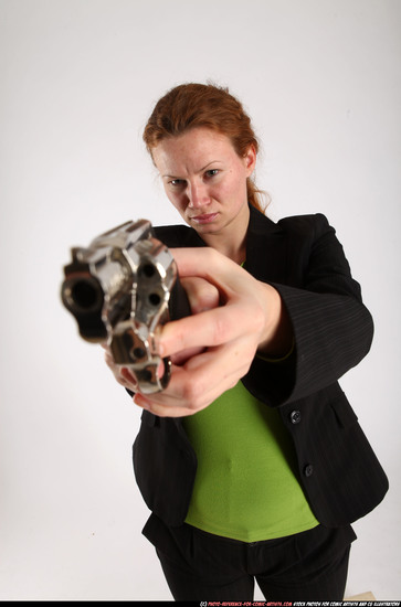 Woman Adult Average White Fighting with gun Standing poses Business