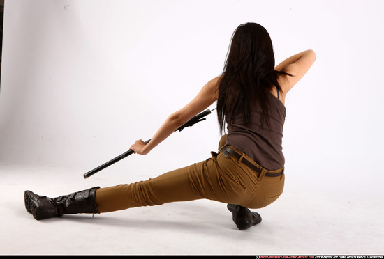 Woman Young Athletic Fighting with sword Kneeling poses Casual Asian