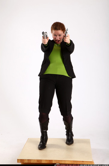 Woman Adult Average White Fighting with gun Standing poses Business