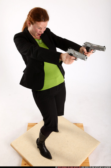 Woman Adult Average White Fighting with gun Standing poses Business