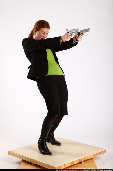 Woman Adult Average White Fighting with gun Standing poses Business