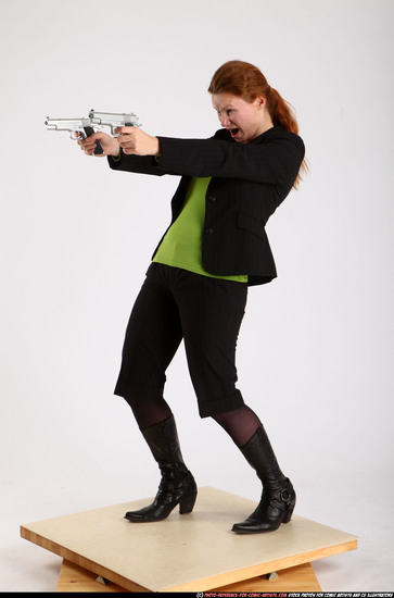 Woman Adult Average White Fighting with gun Standing poses Business