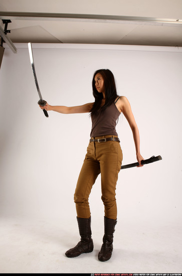 Woman Young Athletic Fighting with sword Standing poses Casual Asian