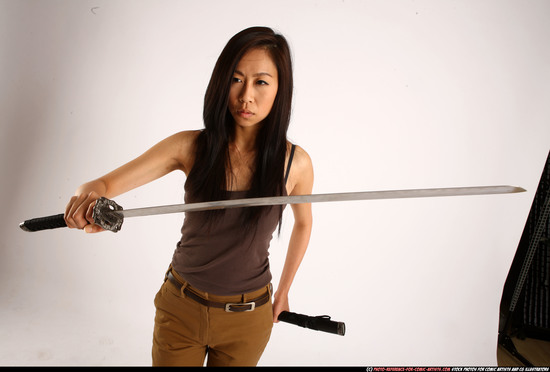 Woman Young Athletic Fighting with sword Standing poses Casual Asian