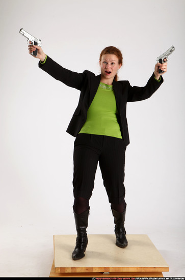 Woman Adult Average White Fighting with gun Standing poses Business