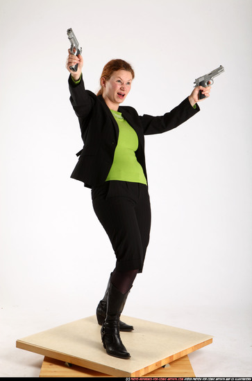 Woman Adult Average White Fighting with gun Standing poses Business