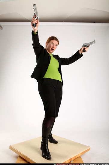 Woman Adult Average White Fighting with gun Standing poses Business