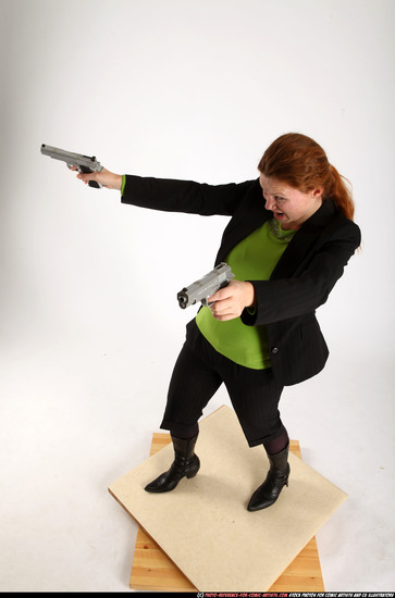 Woman Adult Average White Fighting with gun Standing poses Business