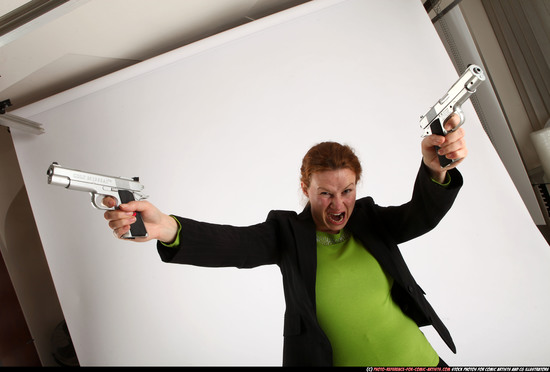 Woman Adult Average White Fighting with gun Standing poses Business