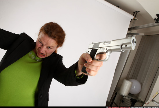 Woman Adult Average White Fighting with gun Standing poses Business