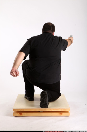 Man Adult Chubby White Fighting with gun Kneeling poses Casual