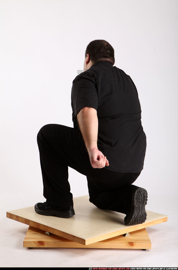 Man Adult Chubby White Fighting with gun Kneeling poses Casual