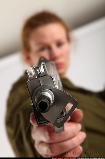 Woman Adult Athletic White Fighting with gun Standing poses Army