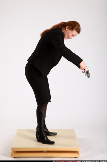 Woman Adult Average White Fighting with gun Standing poses Business