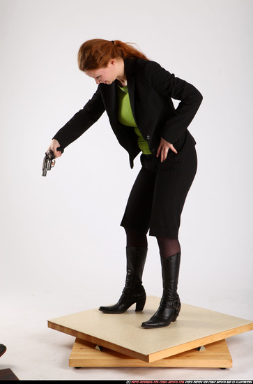 Woman Adult Average White Fighting with gun Standing poses Business