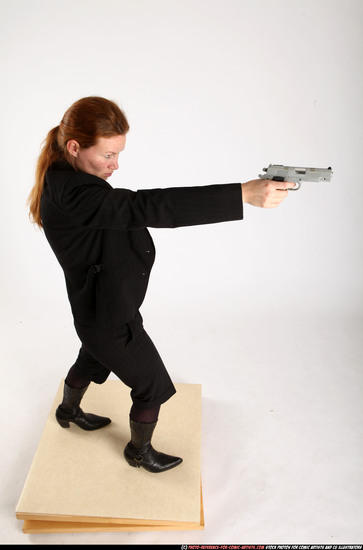 Woman Adult Average White Fighting with gun Standing poses Business