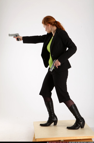 Woman Adult Average White Fighting with gun Standing poses Business