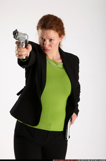 Woman Adult Average White Fighting with gun Standing poses Business