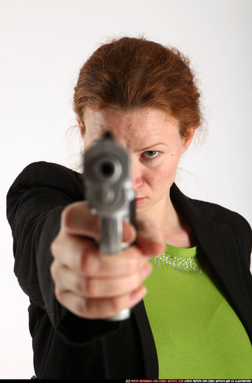 Woman Adult Average White Fighting with gun Standing poses Business