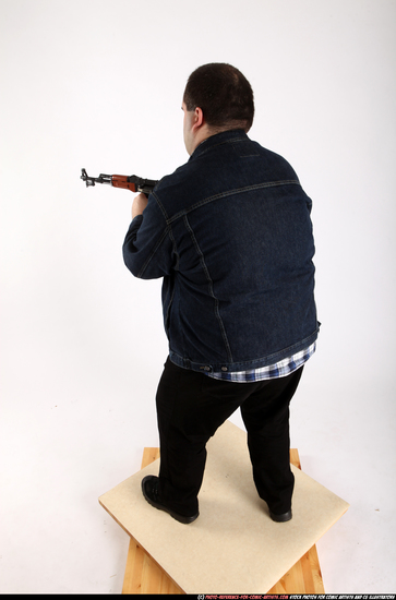 Man Adult Chubby White Fighting with gun Standing poses Casual