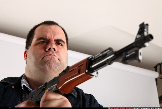 Man Adult Chubby White Fighting with gun Standing poses Casual