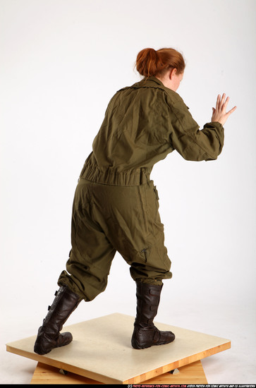 Woman Adult Average White Fist fight Standing poses Army