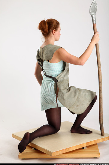 Woman Adult Average White Fighting with spear Kneeling poses Army