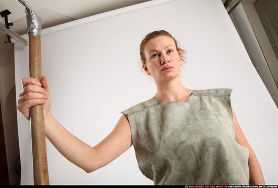 Woman Adult Average White Fighting with spear Kneeling poses Army