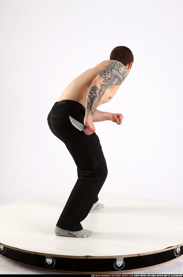 Man Adult Athletic White Fighting with knife Standing poses Pants