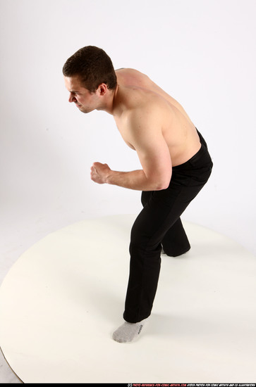 Man Adult Athletic White Fighting with knife Standing poses Pants