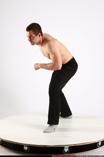 Man Adult Athletic White Fighting with knife Standing poses Pants