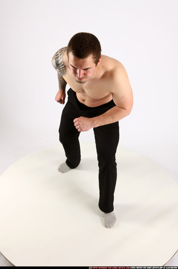 Man Adult Athletic White Fighting with knife Standing poses Pants