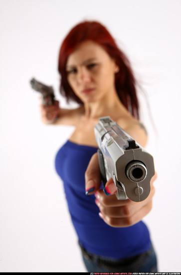 Woman Adult Athletic White Fighting with gun Standing poses Casual