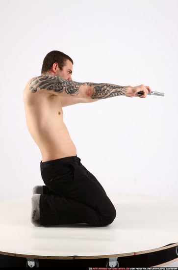 Man Adult Athletic White Fighting with gun Kneeling poses Pants