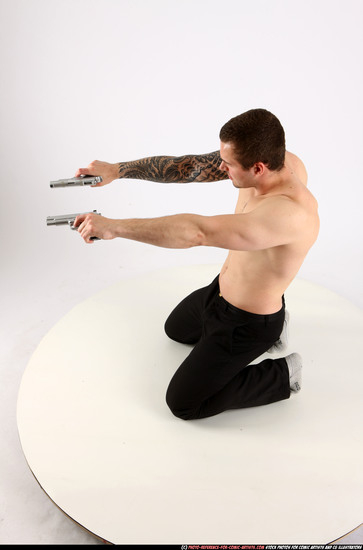 Man Adult Athletic White Fighting with gun Kneeling poses Pants