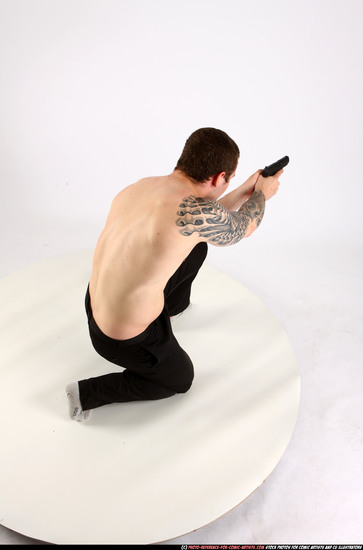 Man Adult Athletic White Fighting with gun Kneeling poses Pants