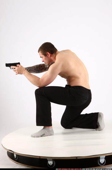 Man Adult Athletic White Fighting with gun Kneeling poses Pants