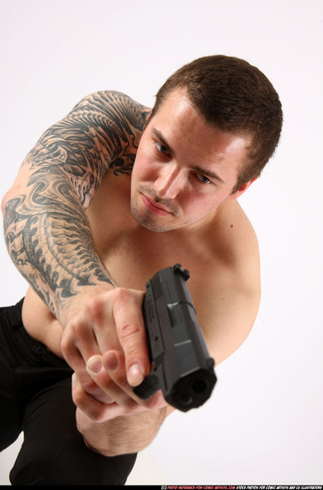 Man Adult Athletic White Fighting with gun Kneeling poses Pants