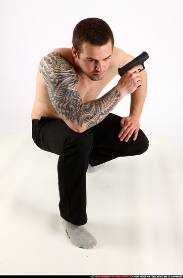 Man Adult Athletic White Fighting with gun Kneeling poses Pants