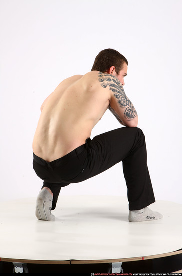 Man Adult Athletic White Fighting with gun Kneeling poses Pants