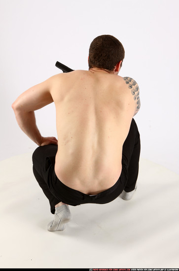 Man Adult Athletic White Fighting with gun Kneeling poses Pants