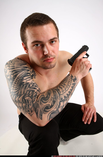 Man Adult Athletic White Fighting with gun Kneeling poses Pants