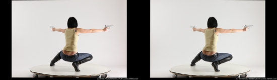 Woman Young Athletic White Fighting with gun Kneeling poses Casual