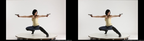 Woman Young Athletic White Fighting with gun Kneeling poses Casual