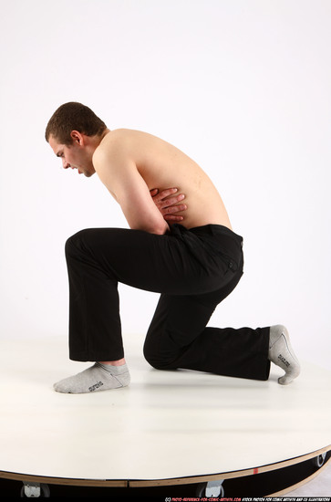 Man Adult Athletic White Neutral Kneeling poses Pants