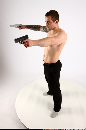 Man Adult Athletic White Fighting with gun Standing poses Pants